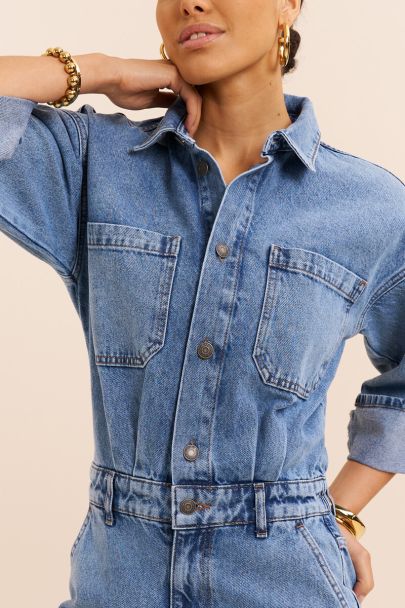 Blauwe denim jumpsuit met omslag
