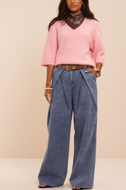 Blue denim trousers with pleats