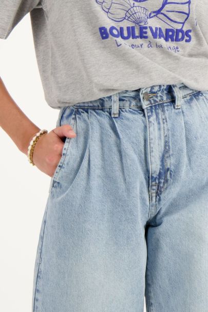 Blue denim wide leg jeans with pleats