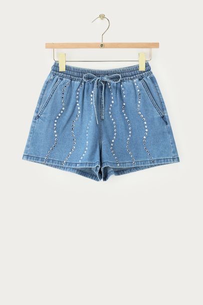 Blaue Shorts mit Strass-Wellenmuster