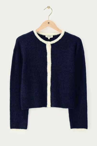 Cardigan bleu avec contraste blanc