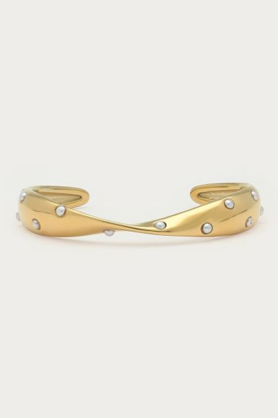 Bold bangle with twist and faux pearls