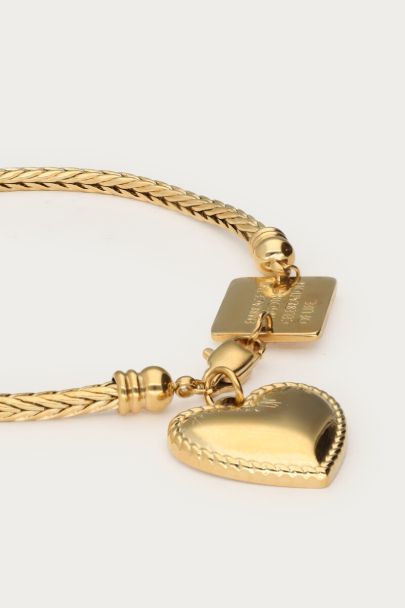 Bold bracelet with heart-shaped charm