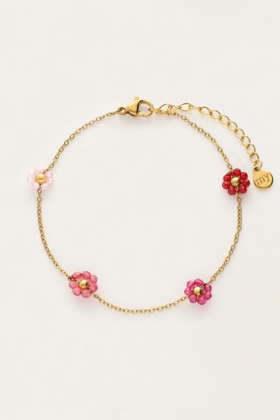 Sunrocks armband met roze en paarse bloemetjes