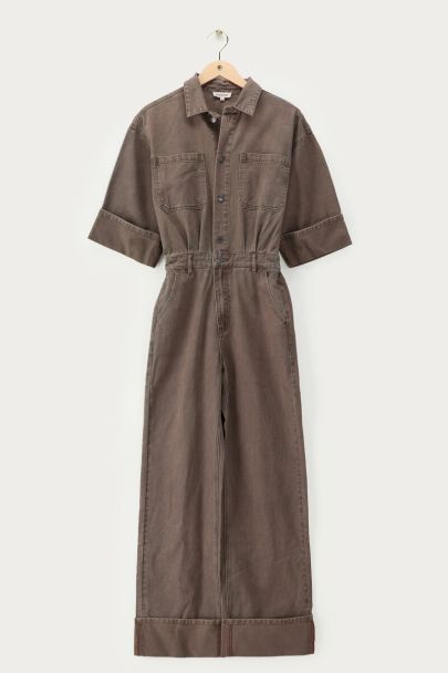 Brown denim jumpsuit with rolled-up sleeves