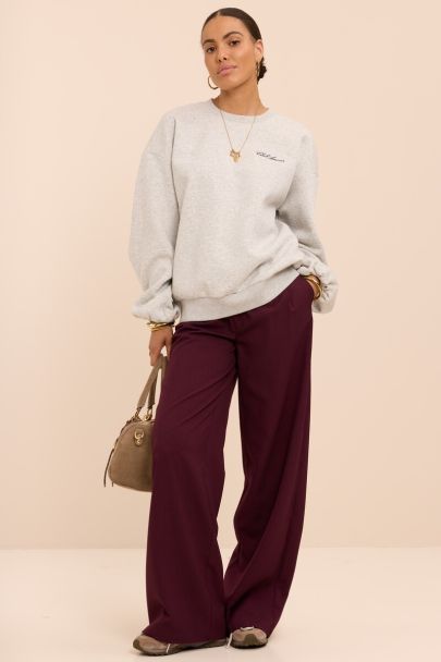 Pantalon large bordeaux avec effet portefeuille et nœud