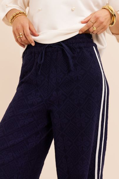 Dark blue lace trousers with side stripes