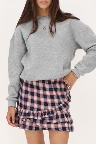 Dunkelblauer Rock mit rosa Karomuster und Lurex