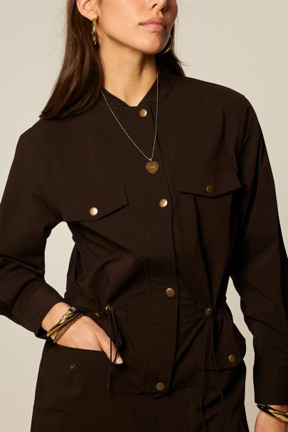 Donkerbruine playsuit met goudkleurige knopen