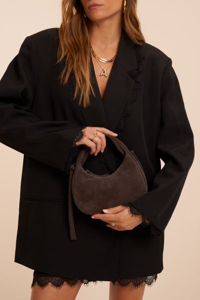 Dark brown suede crescent-shaped bag