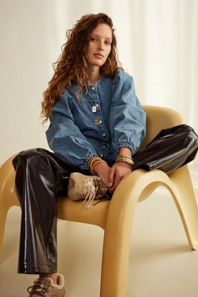 Blauwe denim top met ballon mouwen