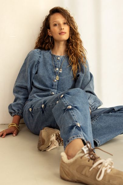 Blue wide leg jeans with studs