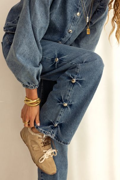 Blue wide leg jeans with studs