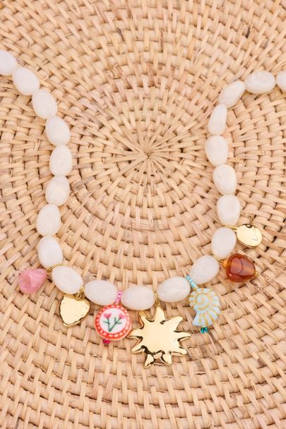 Beige beaded necklace with multicoloured charms