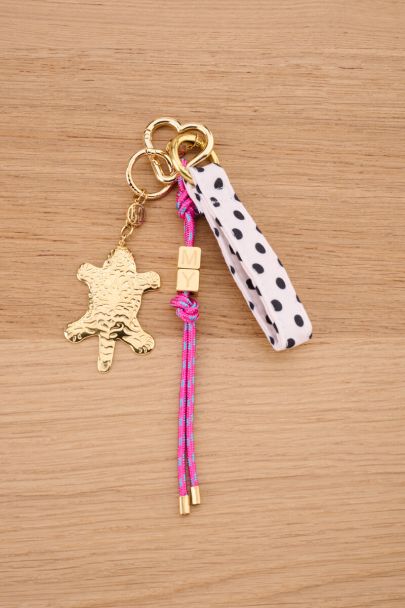 Bag charm with pink cord