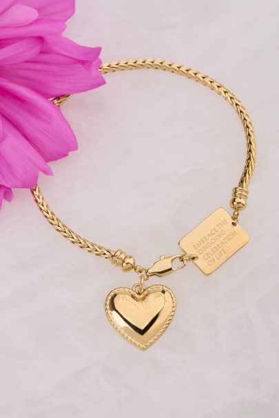 Bold bracelet with heart-shaped charm