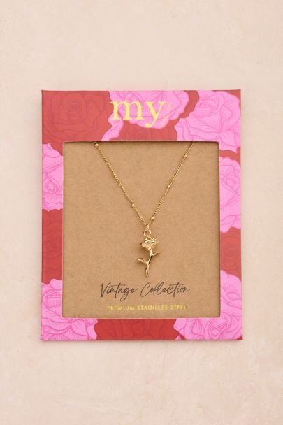 Vintage ketting met dots en roos