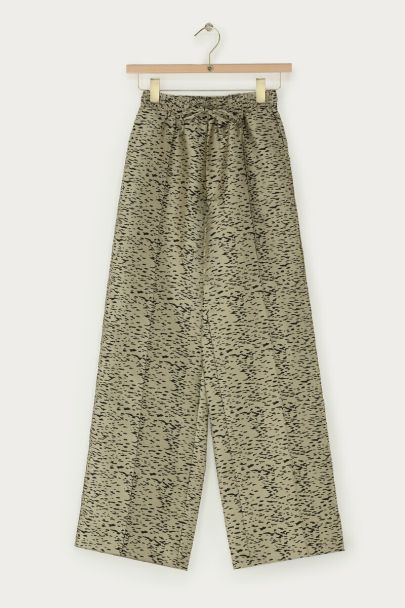 Goldfarbene weite Hose mit Tierprint