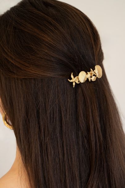 Gold coloured hairpin with shells and starfish