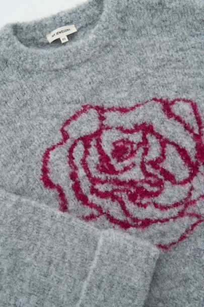 Pull gris avec motif de roses
