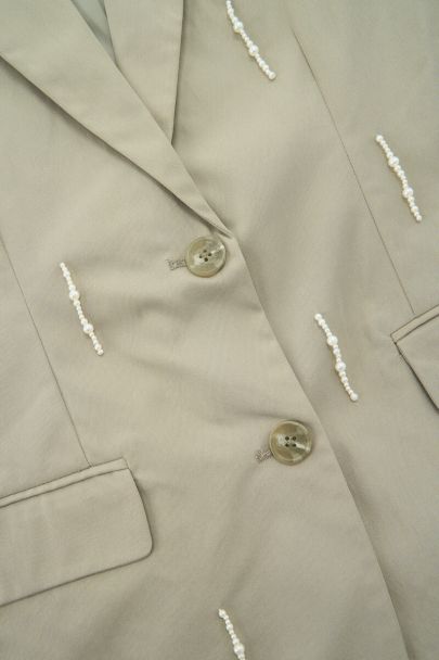 Groene blazer met imitatieparels