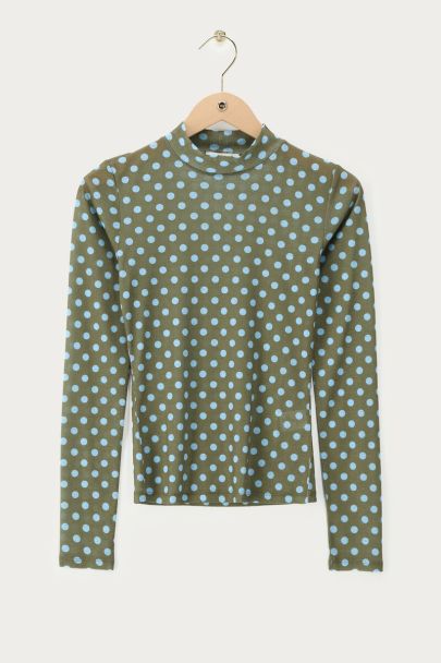 Grünes Mesh-Oberteil mit blauen Polka-Dots