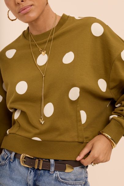 Groene sweater met beige polkadots
