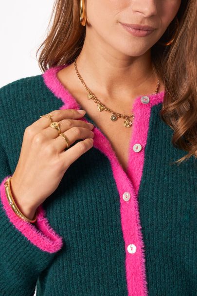 Green cardigan with pink contrast