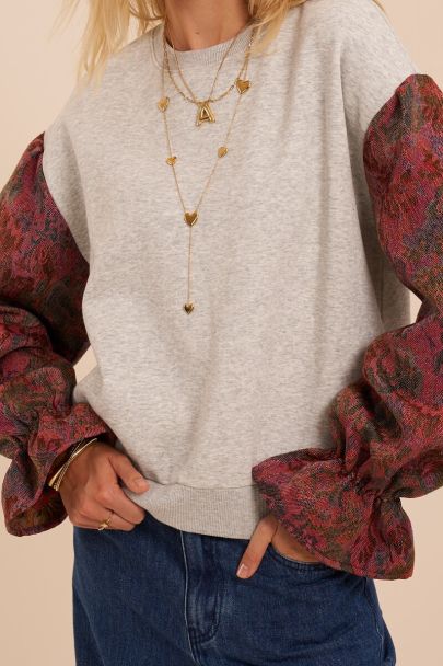 Sweat gris avec manches contrast&eacute;es en jacquard fleuri
