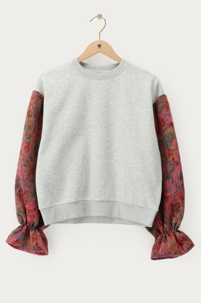 Sweat gris avec manches contrast&eacute;es en jacquard fleuri