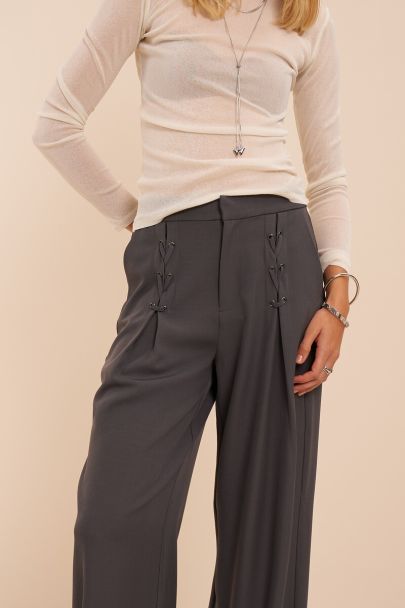 Grey trousers with lace-up details