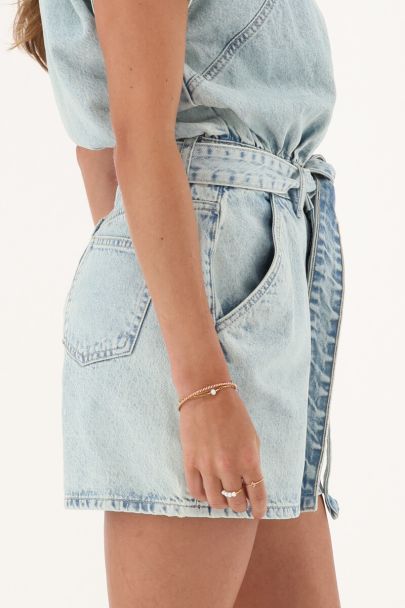 Light blue denim playsuit with belt