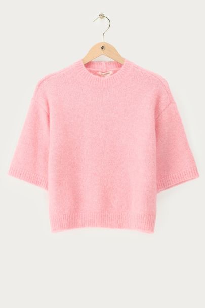 Pull rose pâle à manches courtes