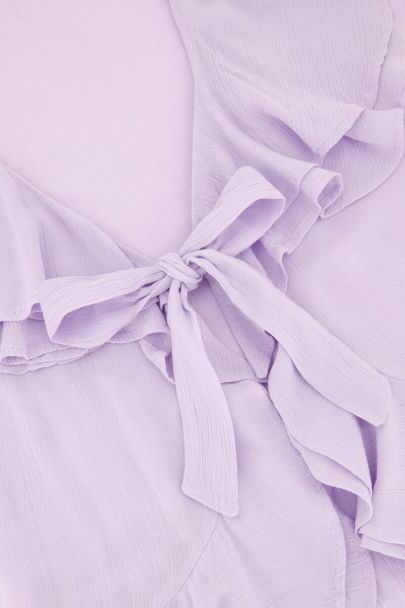 Lila ruffle top met strik