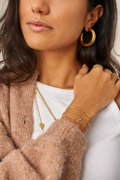 Minimalist bracelet with diagonal stripes and rhinestones