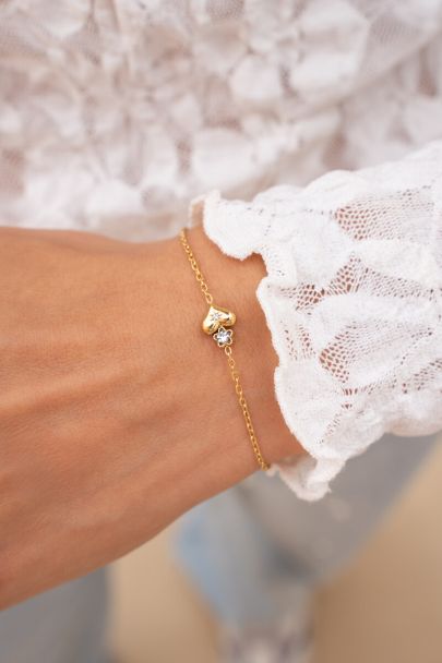 Minimalistische armband met hart & bloemetje