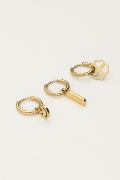 Set van drie oorringen met klaver en smiley