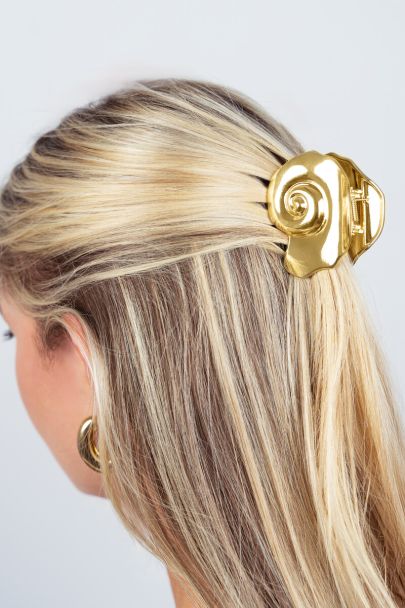 Goudkleurige haarclip slakken schelp