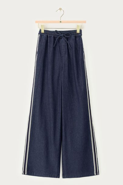 Dark blue denim trousers in sporty look