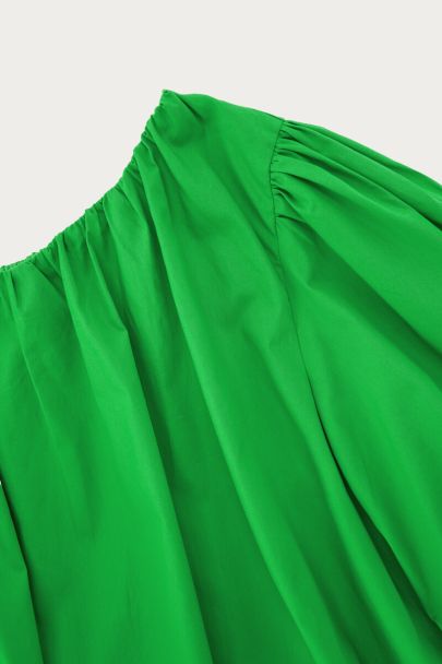 Green one-shoulder top in balloon look