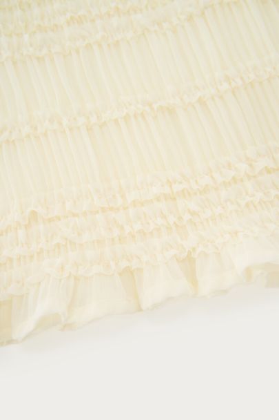 Witte top met plooien en ruffles