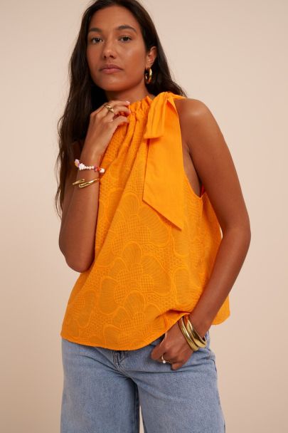 Oranje haltertop met embroidery en strik