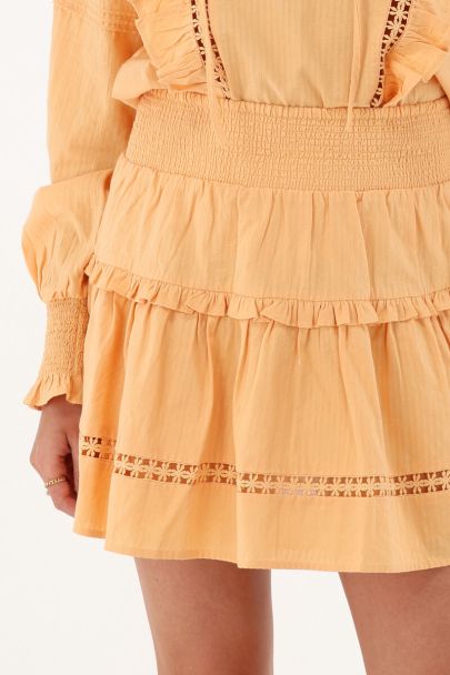 Orange mini skirt with ruffle