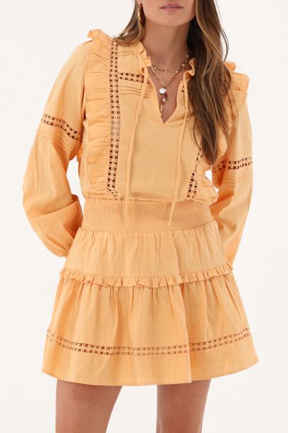 Orange mini skirt with ruffle