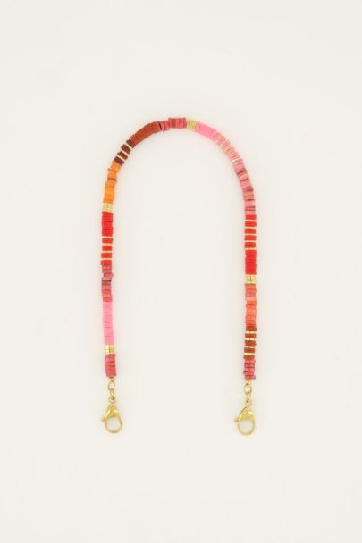 Telefoonkoord met rode en goudkleurige kralen