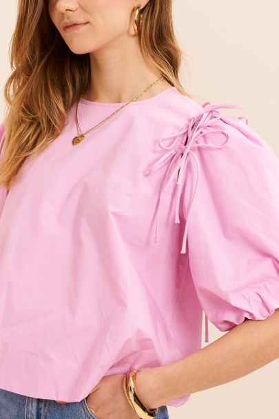 Roze ballon top met strikjes en pofmouwen