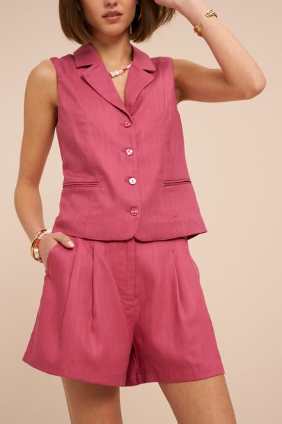 Roze bermuda met plooien