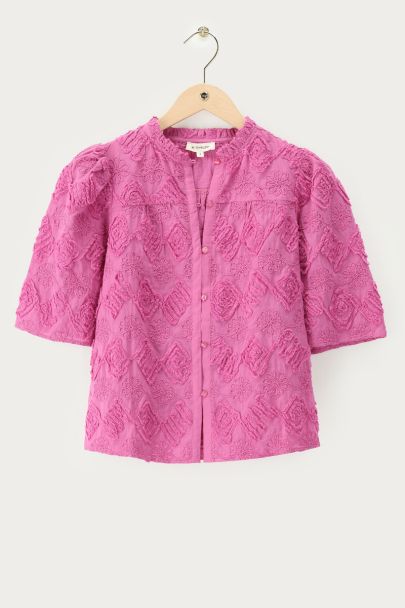 Pink blouse with short sleeves and 3D flowers