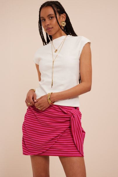 Roze korte crochet rok met strik detail