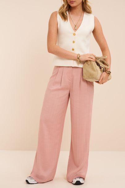 Roze pantalon met wijde pijpen